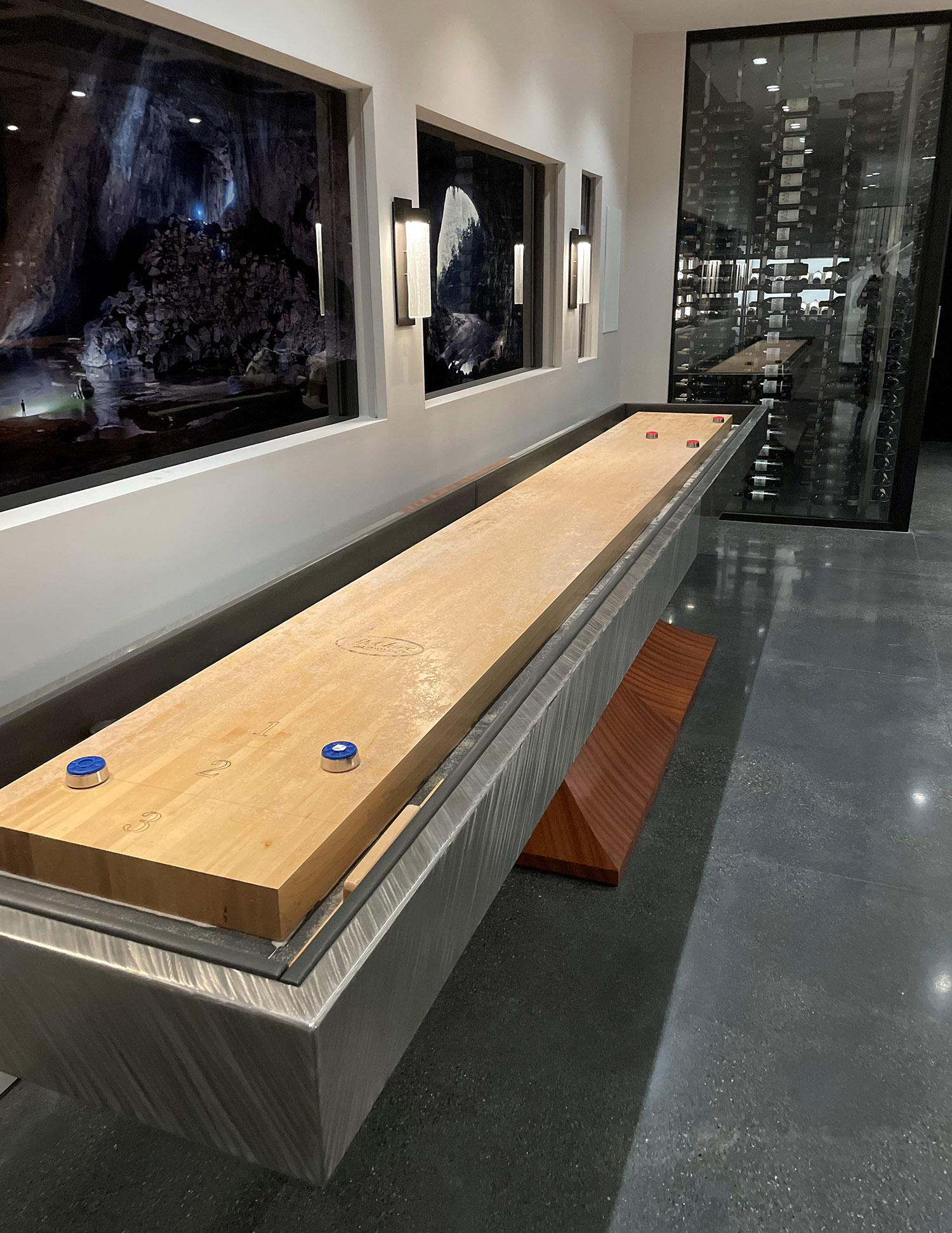 Shuffleboard playing surface and metal edge detail